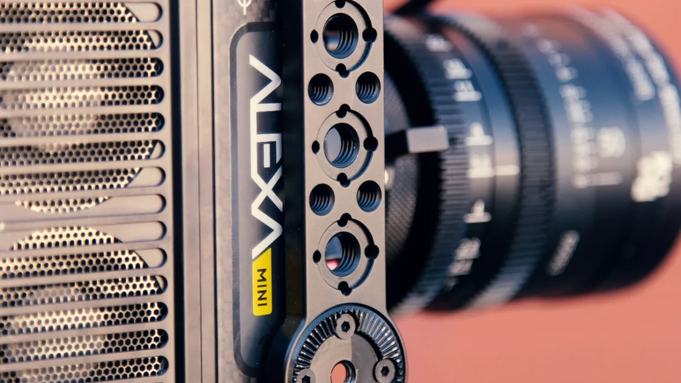 a close up of a camera with a lens attached to it